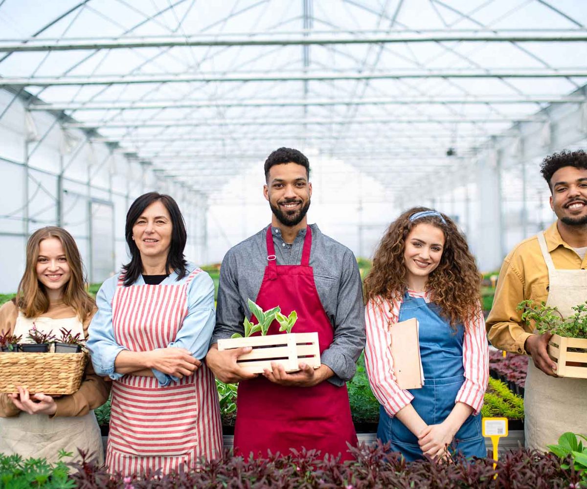 portrait-of-people-working-in-greenhouse-in-garden-2021-05-04-17-55-05-utc.jpg